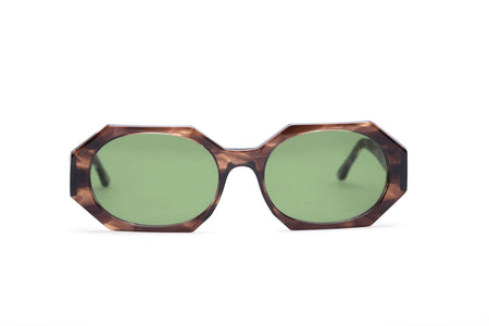 front view of geometric sunglasses with tortoiseshell acetate and green lenses
