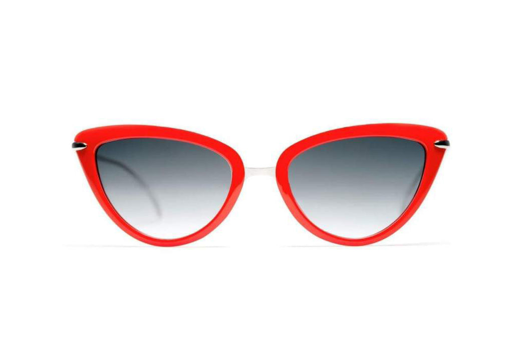 red cat eye sunglasses with black gradient lenses that are made in Italy